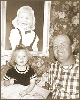 Daddy and Jann in front of the portrait he painted of me.  That portrait is priceless and oh, so cherished.